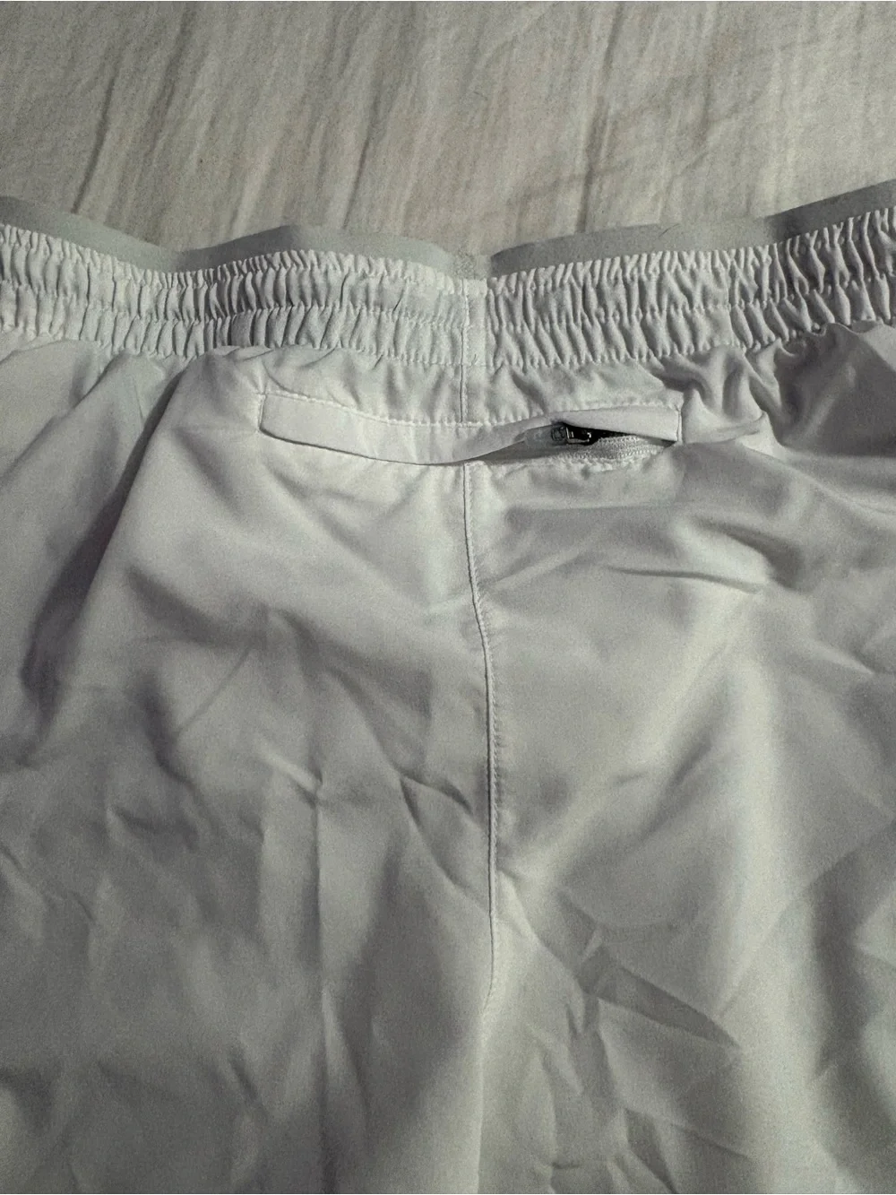 Nike Women’s White Athletic Running Shorts with Silver Swoosh